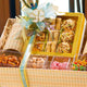 Top view of Sadaqah Sweets Festive Hamper showcasing baklava, nut tarts, and assorted candies in a luxury gourmet gift box for Eid and festive gifting.