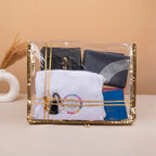 Safar-e-Imaan Women's Set packaged in a transparent gold-trimmed pouch, ideal Hajj Umrah gift kit with hijab, prayer mat, and accessories.