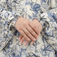 Back view of floral printed prayer dress with head covering