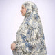 Side profile of floral cotton prayer dress with head covering