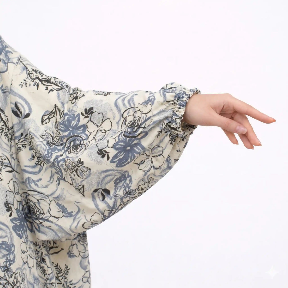 Close-up of floral print fabric on prayer dress