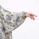 Close-up of floral print fabric on prayer dress