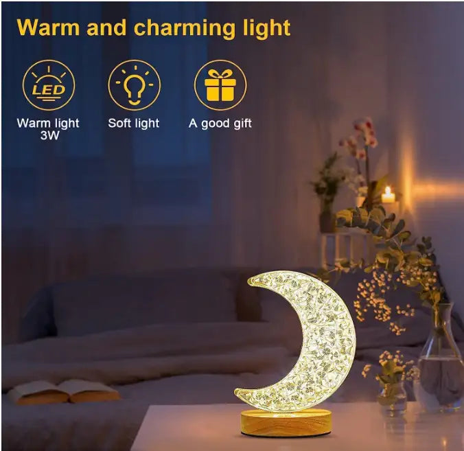 Moon-shaped night light on a table with a cozy room background