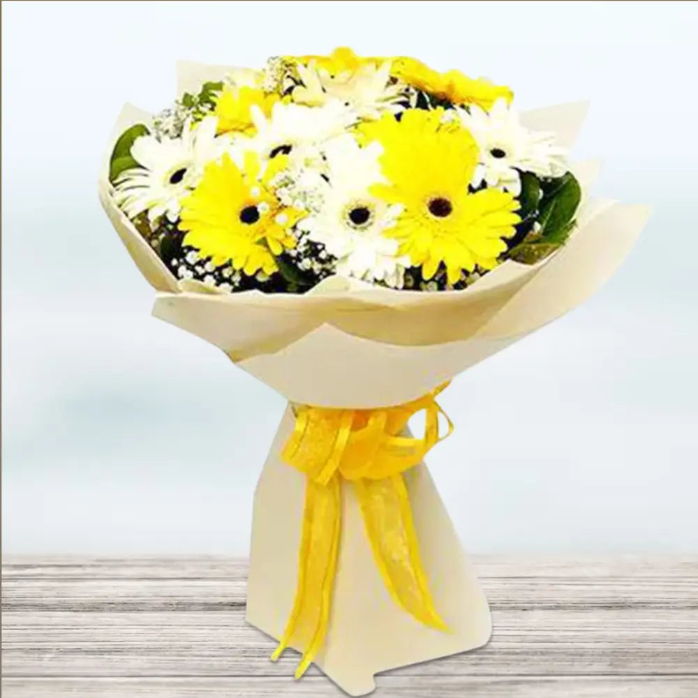 Mix Gerbera Flowers Bouquet with 10 stems featuring 5 yellow and 5 white Gerberas, wrapped in cream paper with yellow ribbon. Ideal for gift giving. Main image