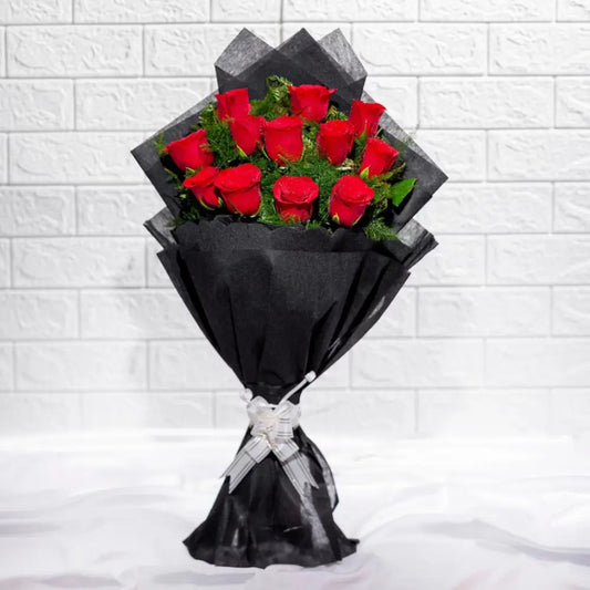 Enchanting Red Roses Bouquet wrapped in elegant black paper, perfect romantic gift for anniversaries or special occasions.