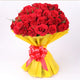 Red Roses Romantic Bouquet with lush red blooms in yellow wrapping and red ribbon, perfect for expressing love and same day flower delivery.