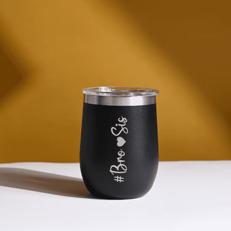 Personalised stainless tumbler in matte black with '#Bro ♥ Sis' engraving, ideal for gifting. Custom stainless tumbler keeps drinks hot or cold. Main image