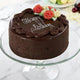 Delightful Chocolate Cake - Decadent Chocolate Cake featuring smooth ganache, piped chocolate borders, and rose decorations, ideal for birthdays and gifts.