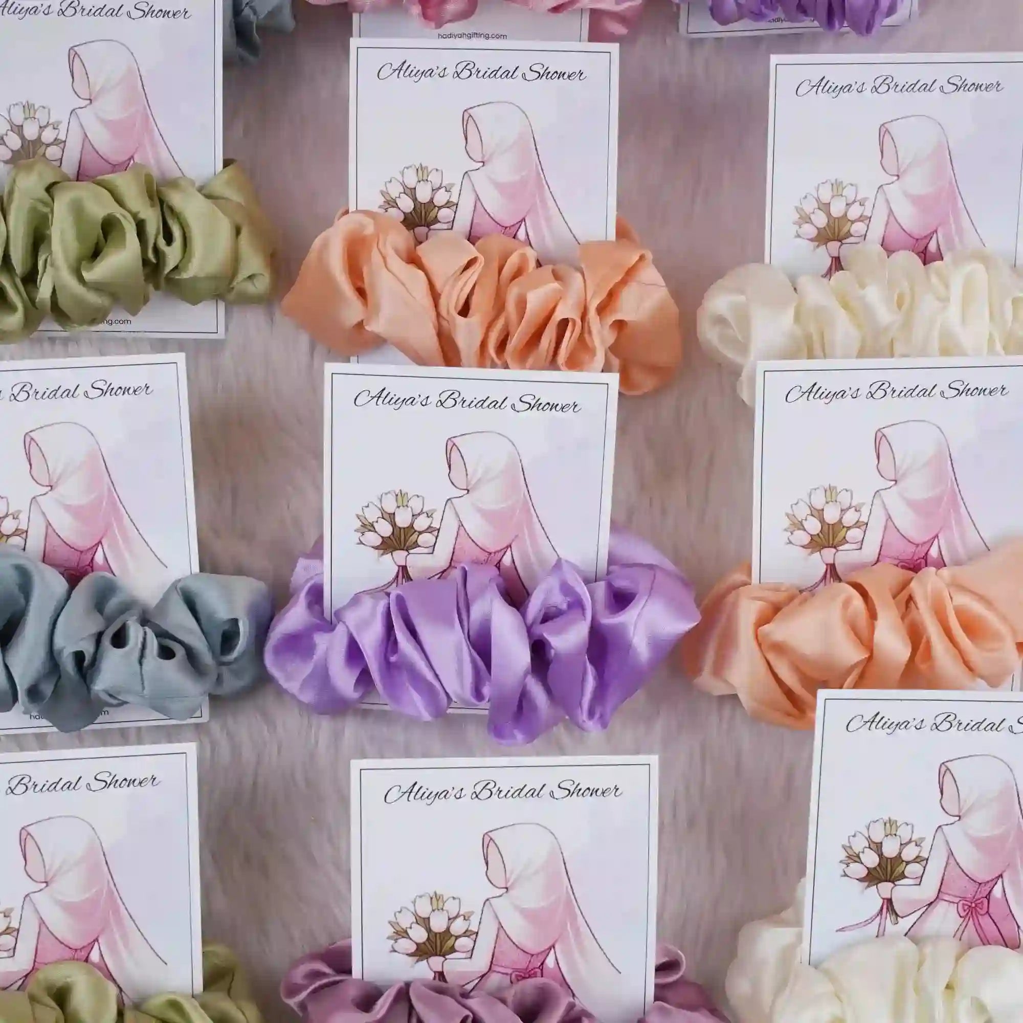 Assorted satin scrunchie card favors for bridal shower with custom illustration and text, ideal wedding ceremony supplies and gifts. Main image