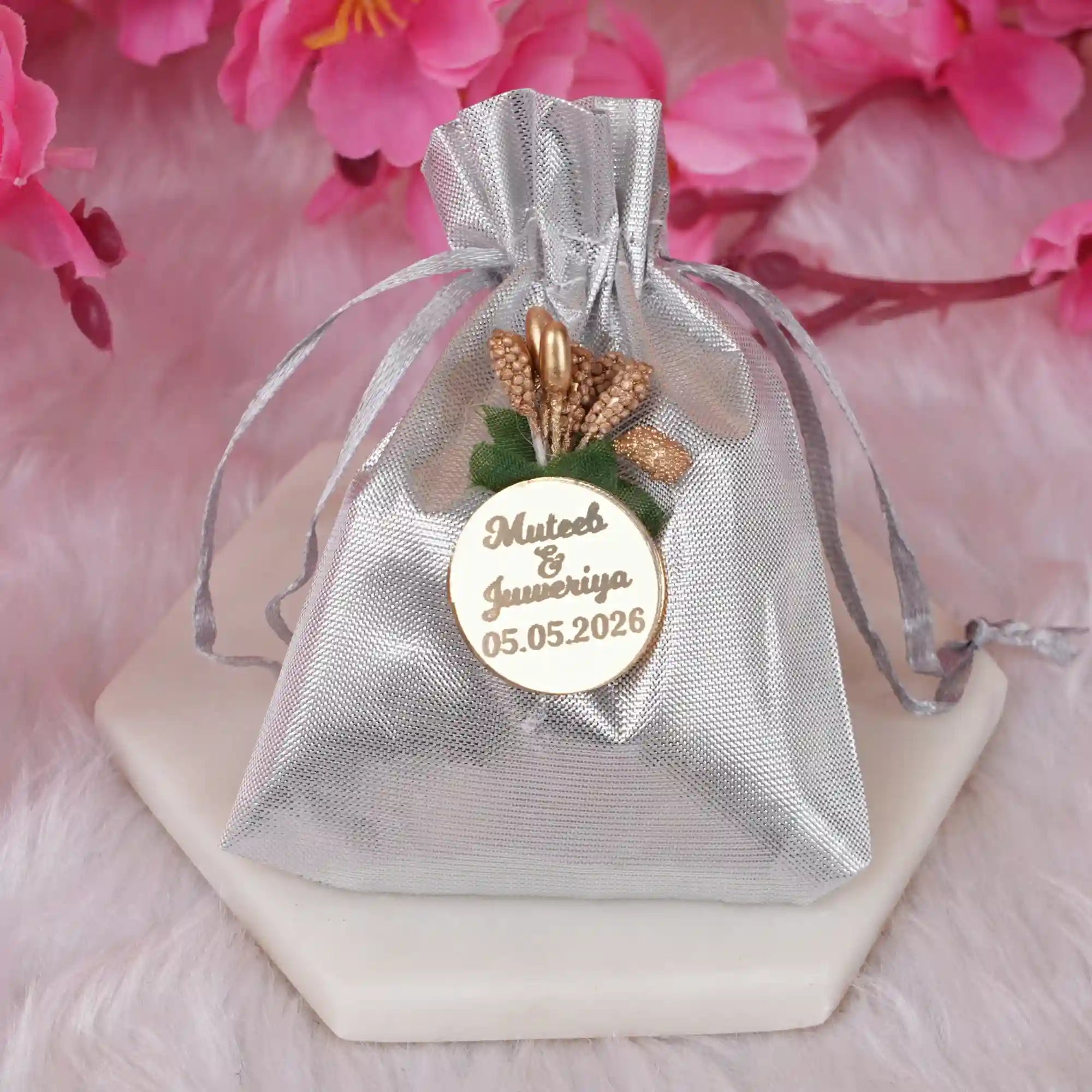 Silver Nikah Favor Dry-Fruit Potli with custom wedding tag, ideal for unique Muslim marriage gifts and wedding celebrations. Main image