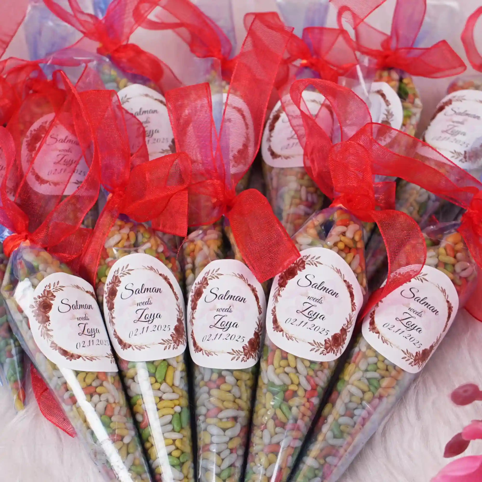 Customized Sounf Cones for Nikah Favors with red ribbons and personalized labels, ideal for Mehndi or wedding ceremonies. Elegant and aromatic wedding gifts. Main image