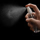 Travel Spray Bottle - Pack of 2 - Essential for Travel, demonstrated in use with fine mist spray, perfect for zamzam or rose water during pilgrimage.