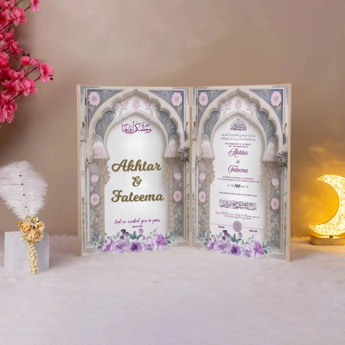 Closed Sukoon-e-Banafsha Nikah Nama with gold foil detailing, monogram design, and date plaque, ideal for bridal and wedding gifts.