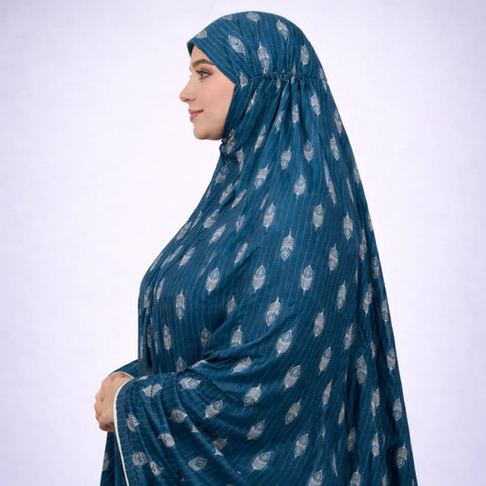 Side view of teal knee-length soft cotton prayer dress featuring modest full coverage and elegant feather print, perfect for religious use.