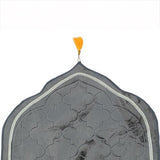 Top section of Grey Dome Janamaz with yellow hanging tassel and detailed stitching. Designed for elegance and spiritual ambiance.