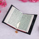 Sawab-e-Jariya bridal gift set featuring a premium Quran with black cover and gold feather bookmark, ideal for wedding gifting.