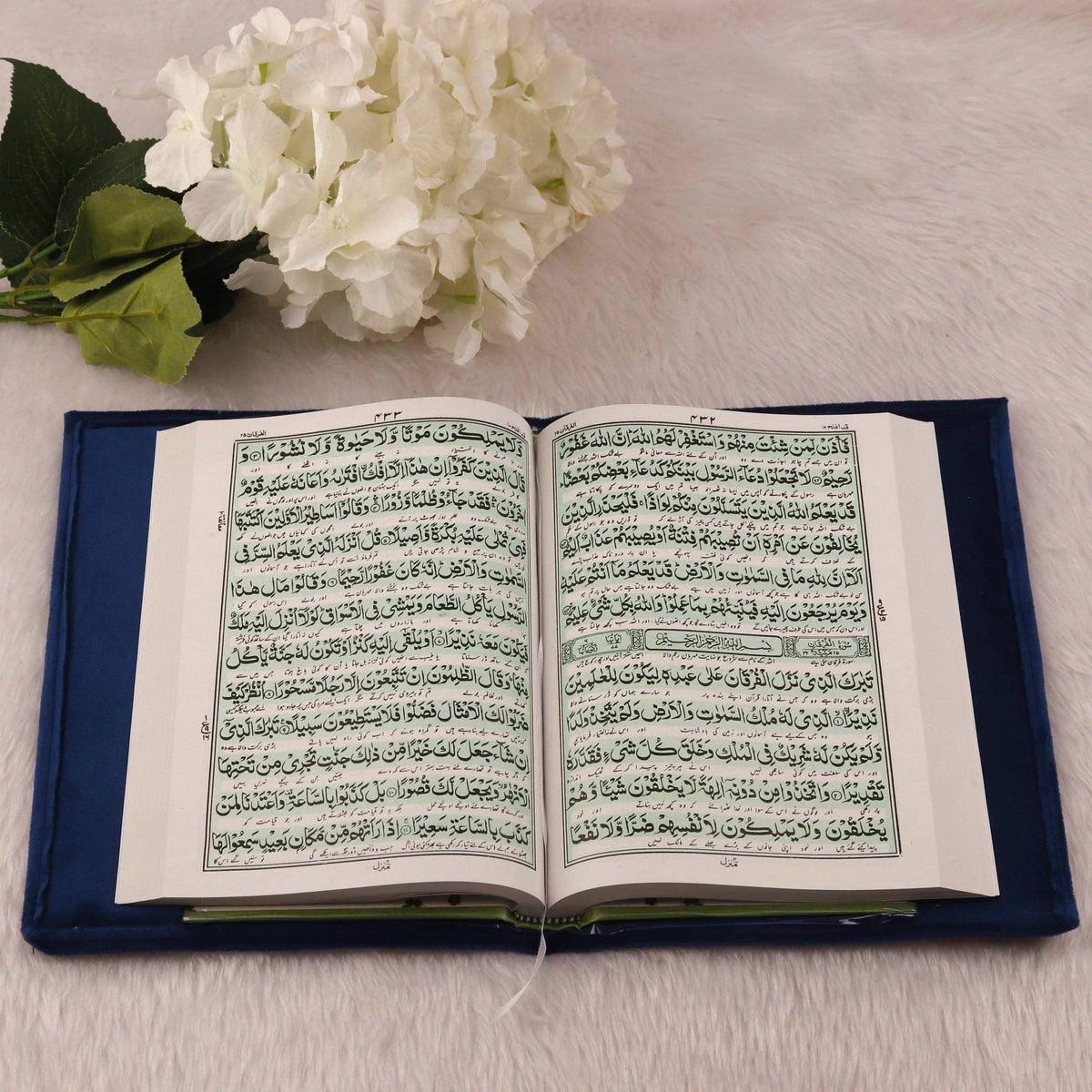 Open Quran with green script from Blue Stones Rehal Hamper. High-quality print for enhanced readability and devotion.