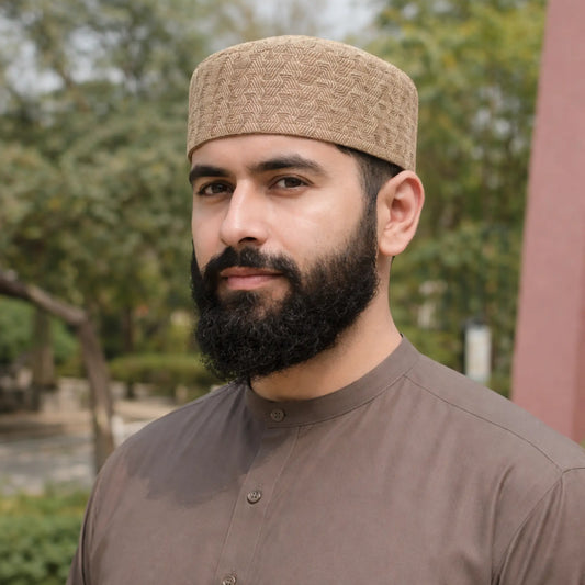 Man wearing beige topi with traditional attire outdoors