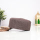 Brown prayer cap with intricate geometric pattern for religious ceremonies
