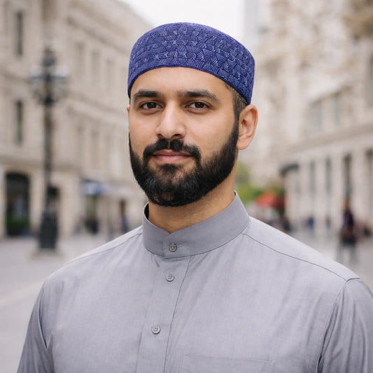 Man wearing blue prayer cap, traditional Islamic headwear for men