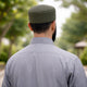 Men's Islamic prayer cap in green, back view