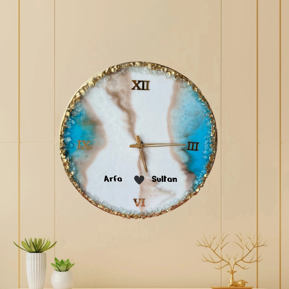 Personalized Turquoise Wall Clock with names and heart symbol, ideal for anniversary or housewarming gifts in stylish interiors.