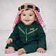 Baby boy wearing traditional green thobe with gold embroidery and tassel