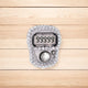 Close-up of silver digital tasbeeh counter showing 99999. Sleek and compact for modern zikr practices.