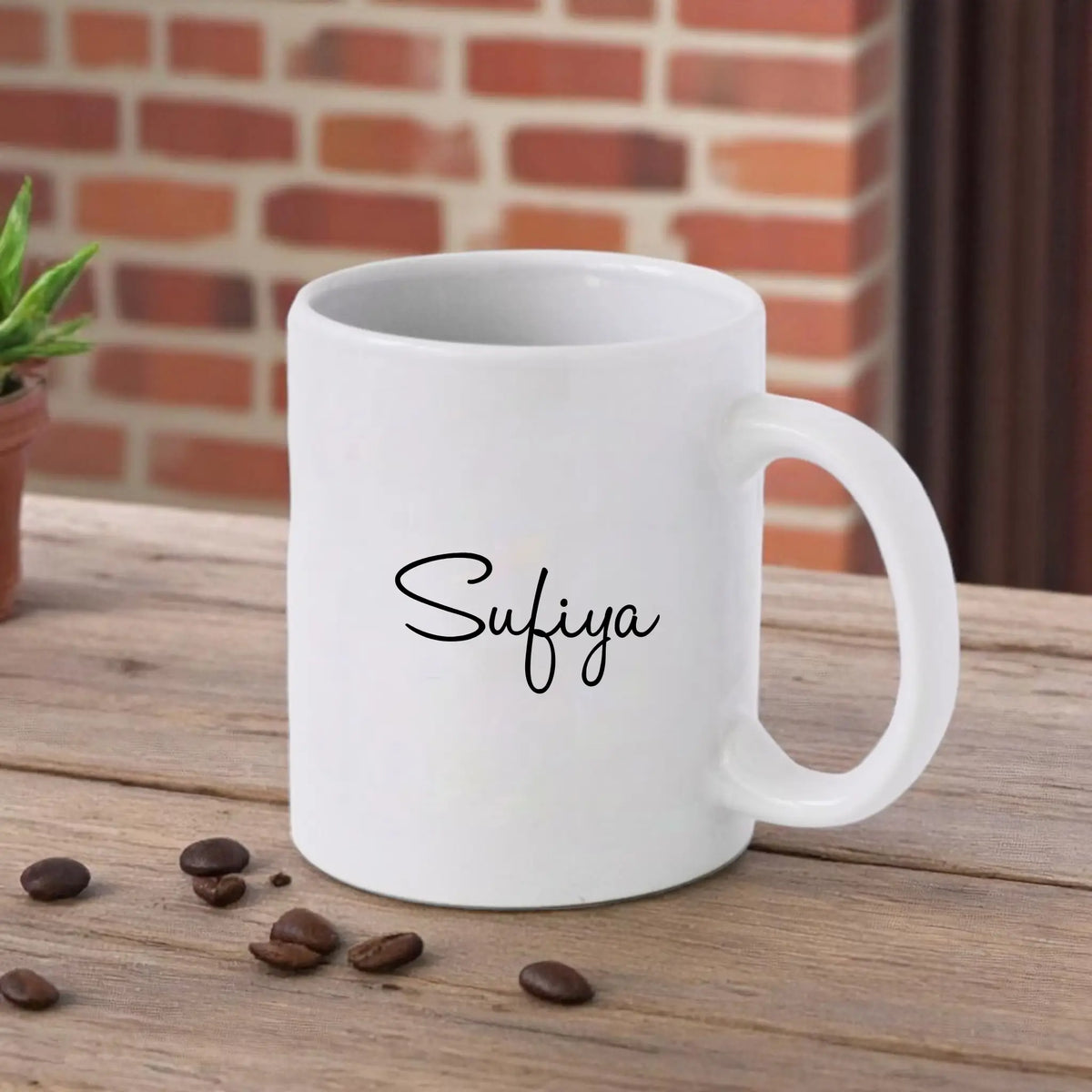 Personalized Super Mom Mug with custom name 'Sufiya' on the back. Ideal ceramic gift for moms, microwave safe and durable.