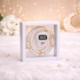 alt="White Transparent Tasbeeh Combo Favor containing a 100-bead pearl tasbeeh and a matching digital counter inside a clear square PVC box."