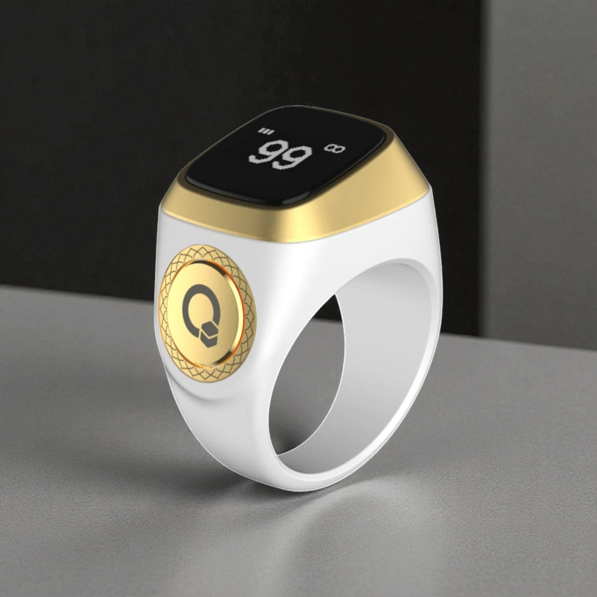 White and gold Zikr Ring smart tasbeeh with OLED screen, designed for prayer tracking and religious gifting.