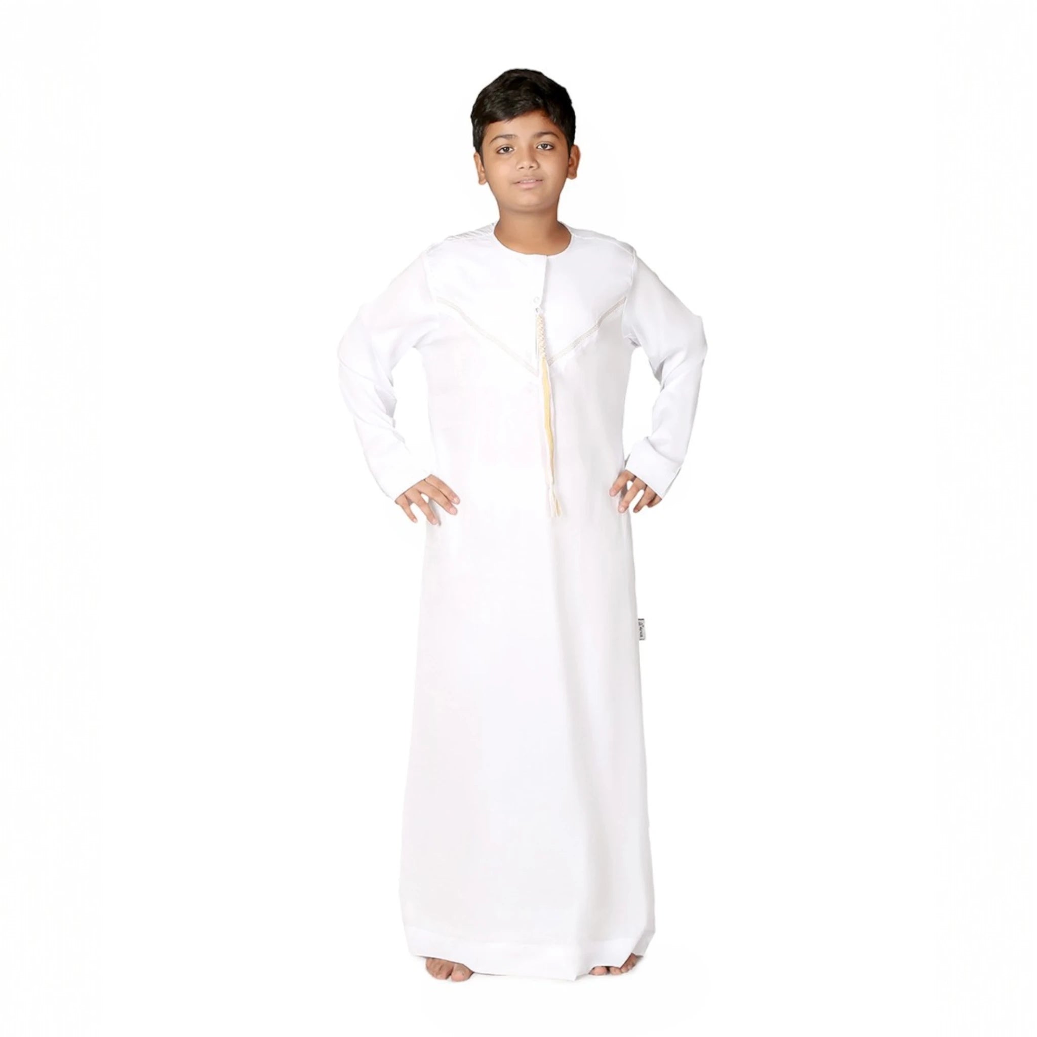 White Kids Thobes Omani Style with tassel detail, perfect for Eid or gatherings. Made from imported fabric for comfort and elegance. Main image