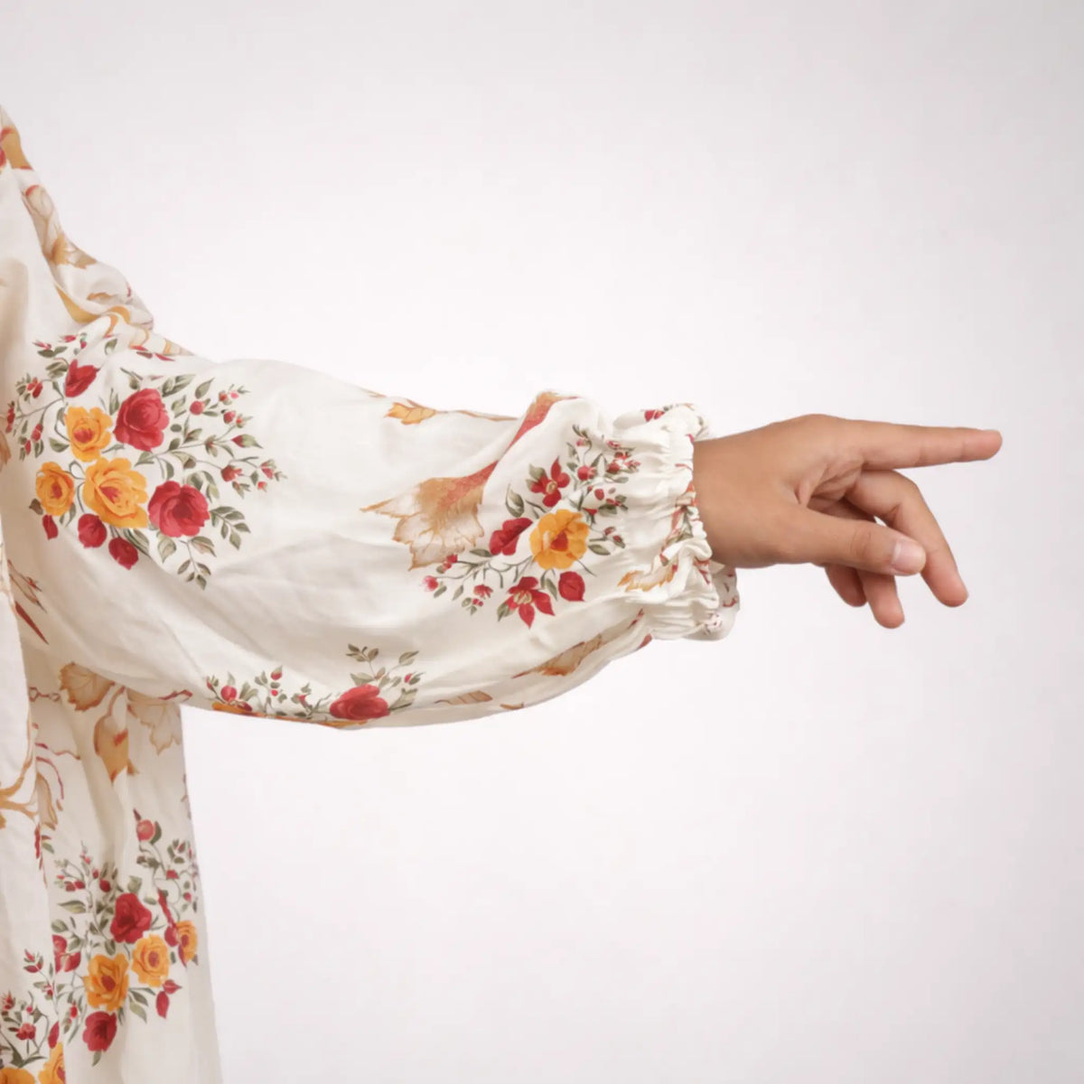 Detailed view of Prayer Dress 12 sleeve with floral print and elastic cuff, emphasizing breathable chiffon fabric and elegant design.