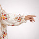 Detailed view of Prayer Dress 12 sleeve with floral print and elastic cuff, emphasizing breathable chiffon fabric and elegant design.