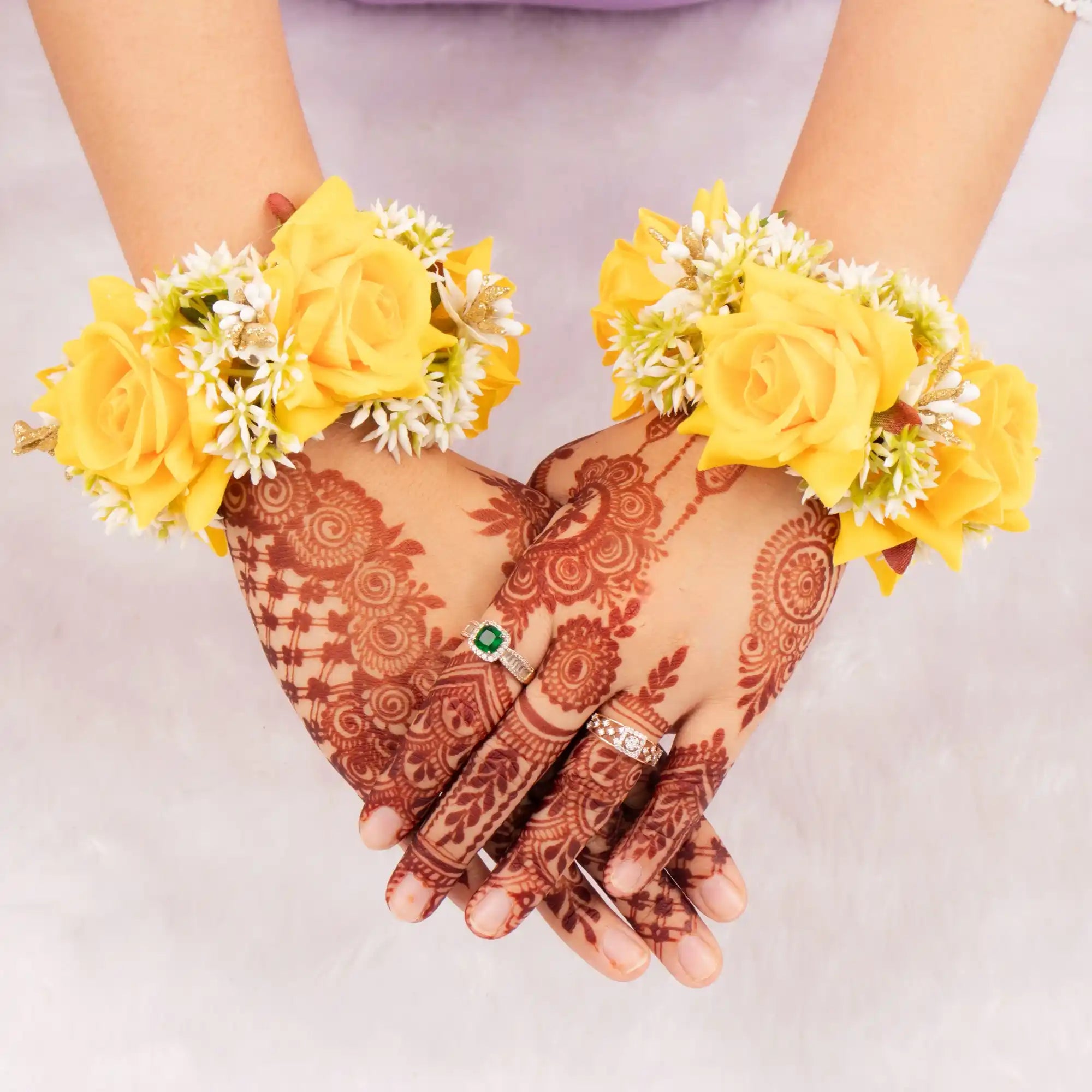 Handcrafted Floral Gajra - Enhance Traditions | Bridal Accessory featuring yellow roses and white buds worn on wrists, ideal for Haldi and Mehndi ceremonies. Main image