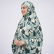 Side view of woman wearing lightweight printed cotton prayer dress with tied back
