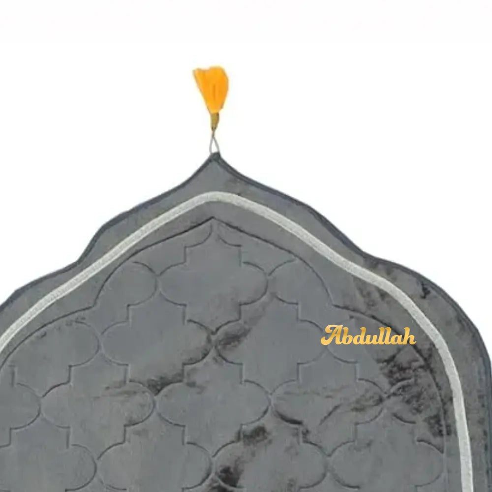 Decorative headscarf with intricate patterns and 'Abdullah' branding on a white background