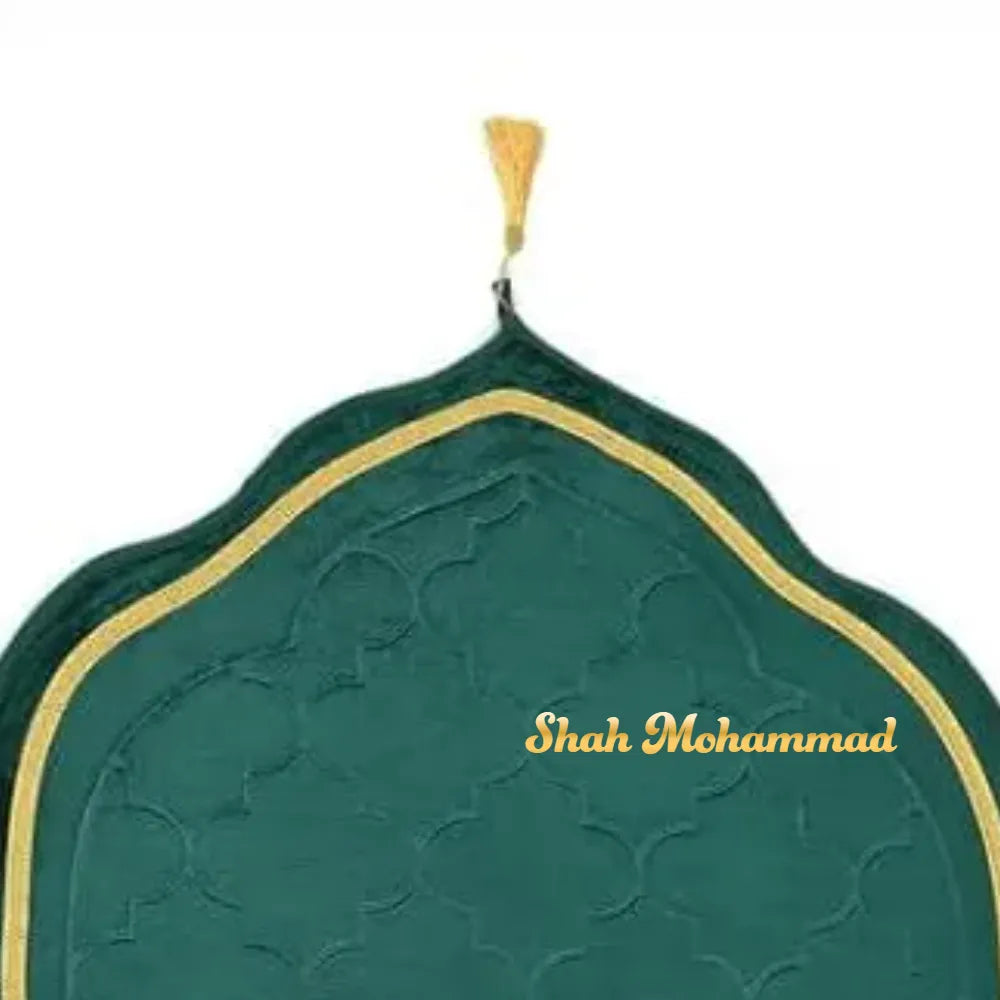 Green prayer mat with gold border and 'Shah Mohammad' branding on a white background