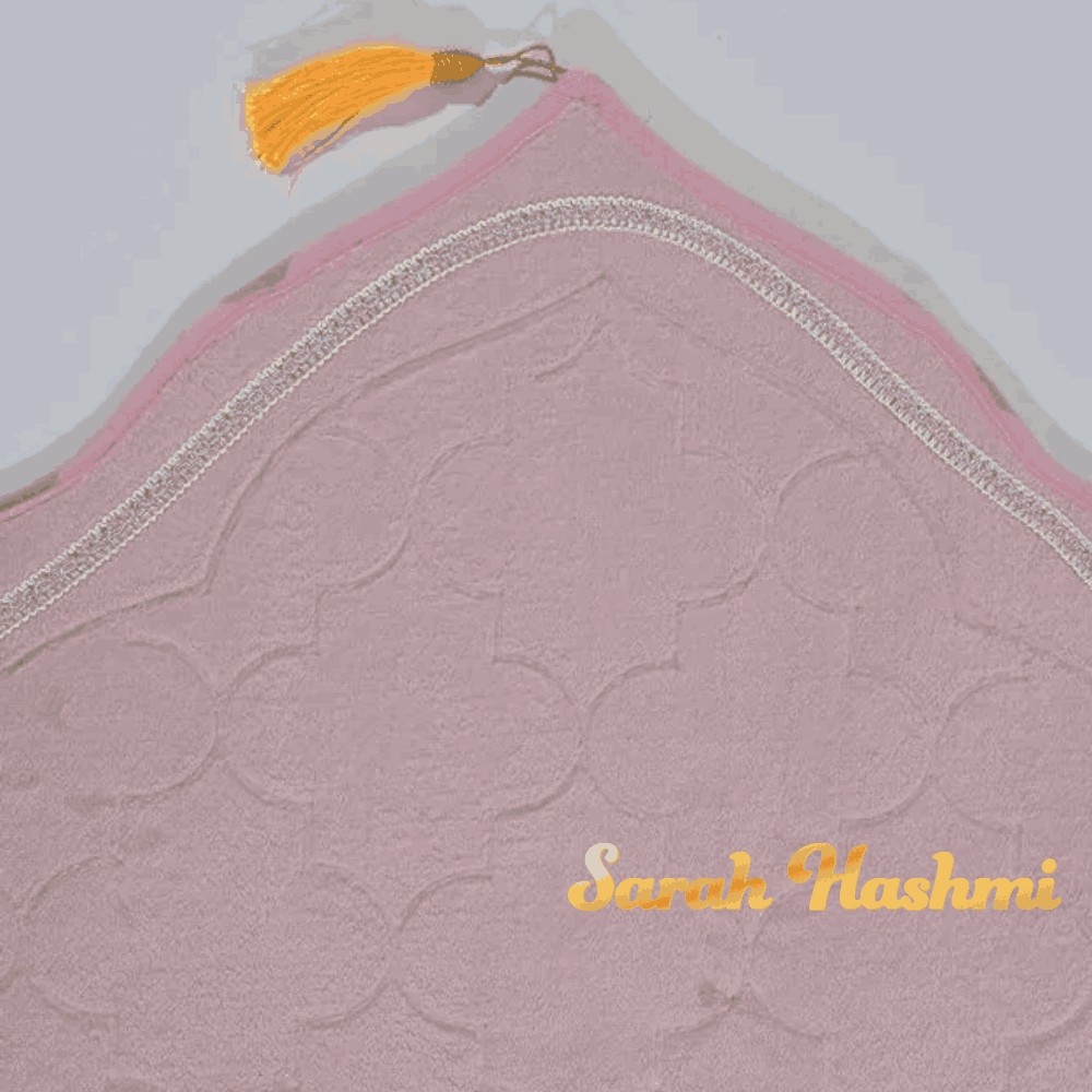 Close-up of Personalized Dome Janamaz with 'Sarah Hashmi' name embroidery in gold, showcasing custom gift potential.