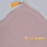 Close-up of Personalized Dome Janamaz with 'Sarah Hashmi' name embroidery in gold, showcasing custom gift potential.