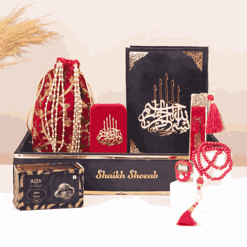 Personalized Barakah Velvet Gift Hamper with name 'Shaikh Shoeab', includes velvet Quran, Tasbeeh, Ajwa dates, and red velvet pouch for Eid gifting.