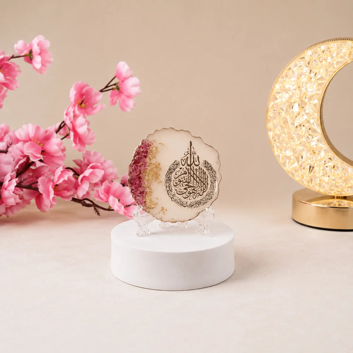 Handmade 3" Ayatul Kursi Floral Frame displayed with a crescent lamp and pink flowers, ideal for Ramadan or Eid home decor and Islamic gifting.