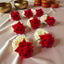Wedding Hand Gajra Favors with red roses and white flowers, ideal for Haldi Mehndi ceremonies and bridal accessories. Pack of 2 handmade floral gajras.