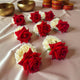 Wedding Hand Gajra Favors with red roses and white flowers, ideal for Haldi Mehndi ceremonies and bridal accessories. Pack of 2 handmade floral gajras.
