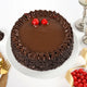 Round Death By Chocolate Cake with glossy ganache top, cherry garnish, and chocolate chip sides, great for gifting and celebrations.