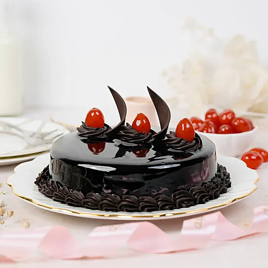 Yummylicious Chocolate cake sliced to show the layers inside