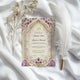 Flat lay of Purple Legacy Nikah Nama Frame - Islamic Wedding Frame on white satin with feather pen, ideal for Nikah ceremony essentials.