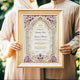 Couple holding Purple Legacy Nikah Nama Frame - Islamic Wedding Frame, a personalized wedding certificate in ornate purple and gold design.