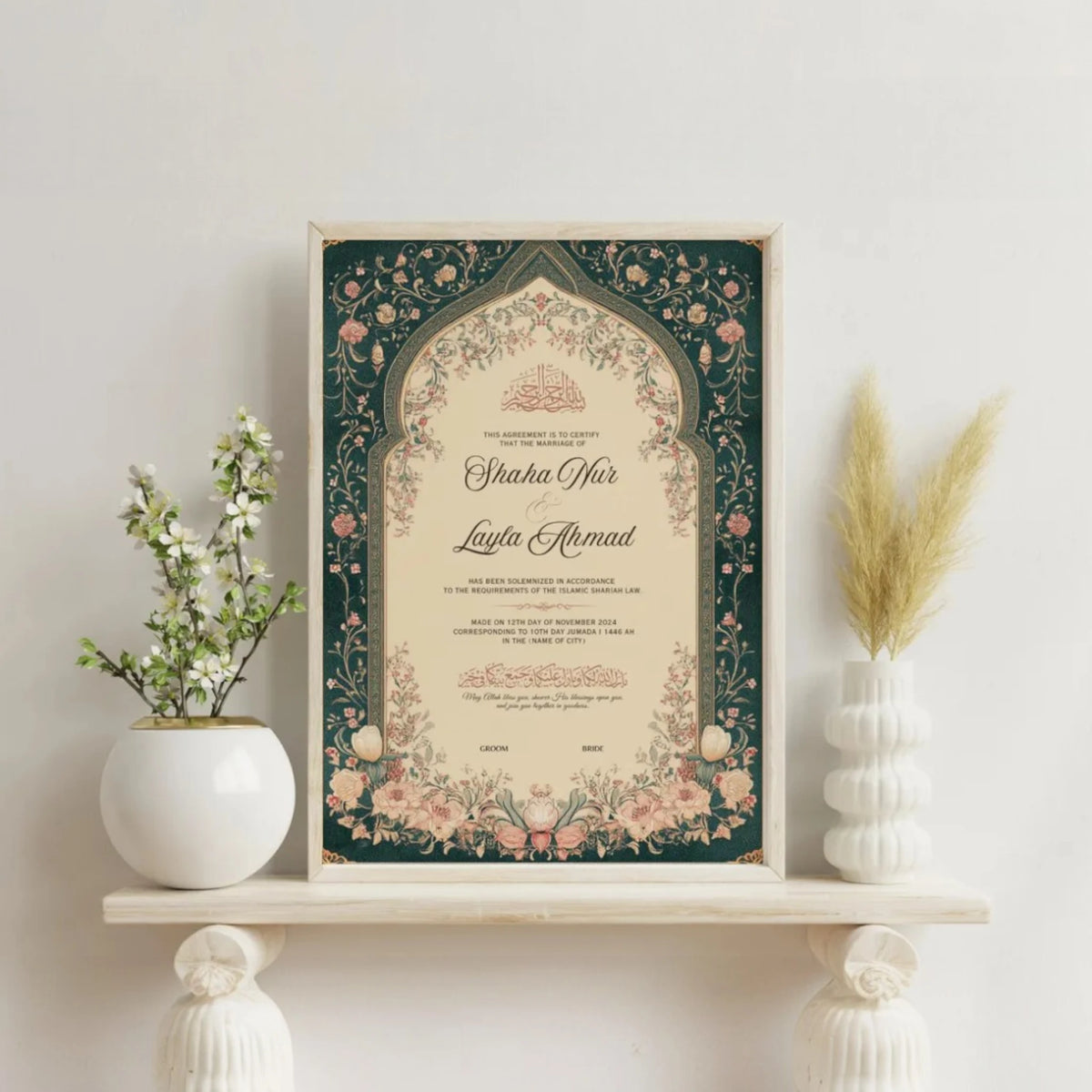 Green Legacy Nikah Nama Frame - Islamic Wedding Gift placed on a white shelf with vases, highlighting its ornate Islamic arch design and pastel floral art.