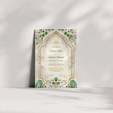 Emerald Nikah Nama Frame leaning against a wall in soft lighting, featuring handcrafted Islamic marriage certificate with green accents.